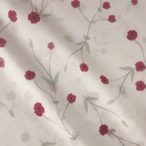 پارچه تریکو گلدار با گل های ریز صورتی کد ۴۰۴۱۰۴۶