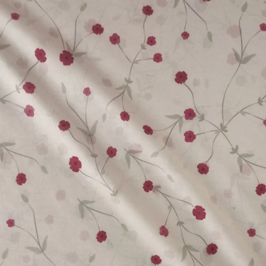 پارچه تریکو گلدار با گل های ریز صورتی کد 4041046